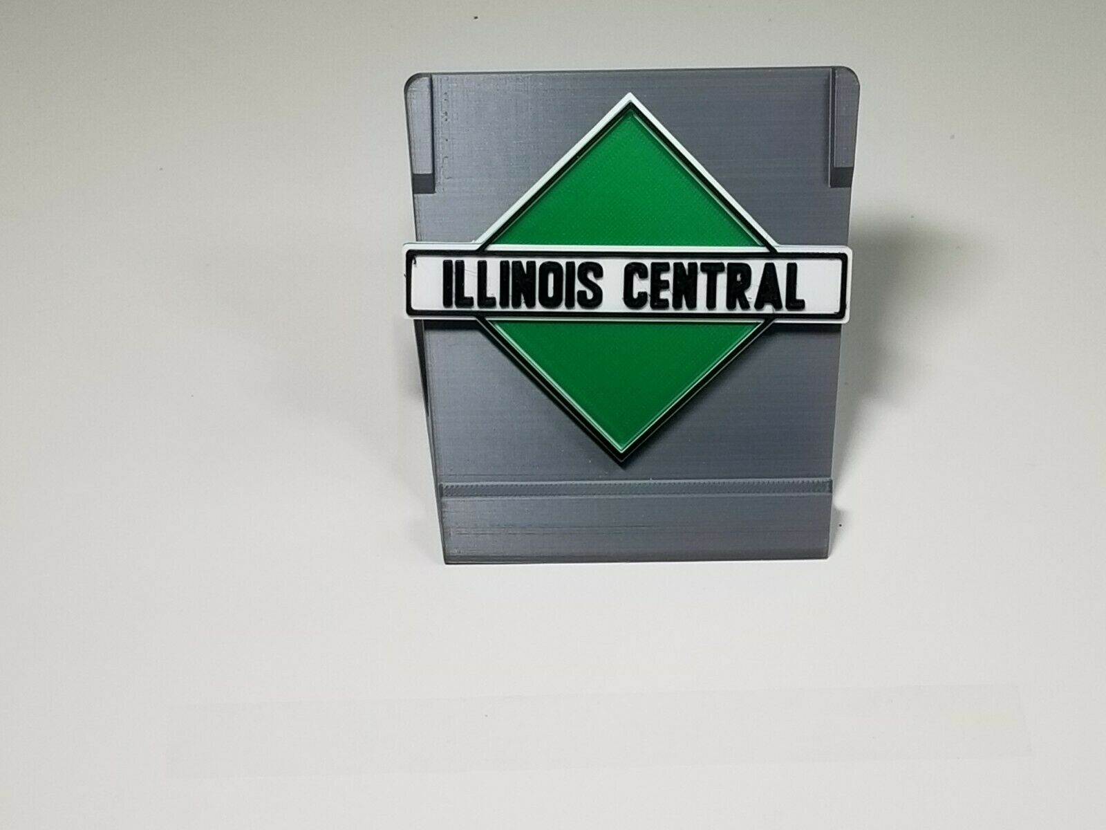 Railroad Logo Badge Reel - Penn Central Green/Orange C